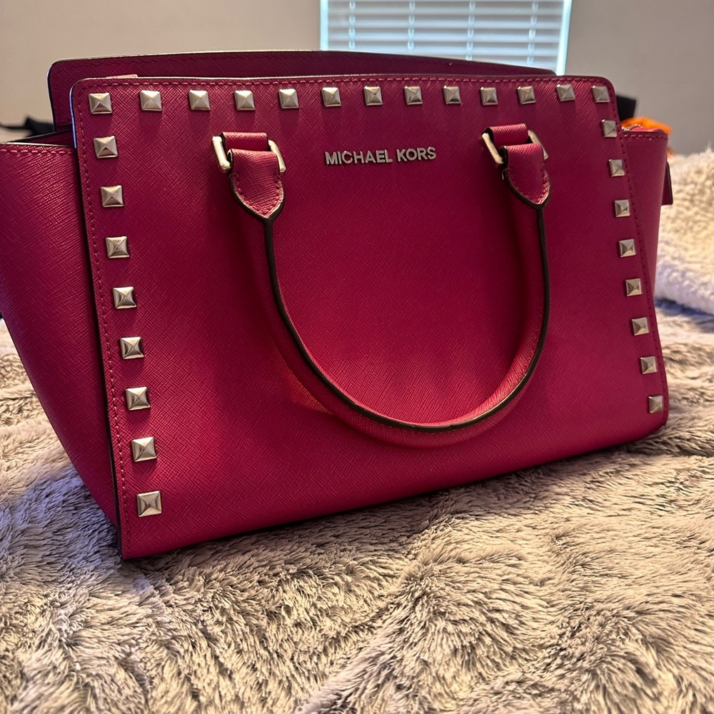 Like new Authentic pink Michael Kors handbag.